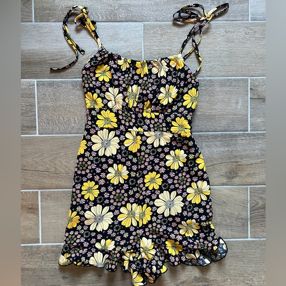 Xtraordinary Black and Yellow Floral Romper